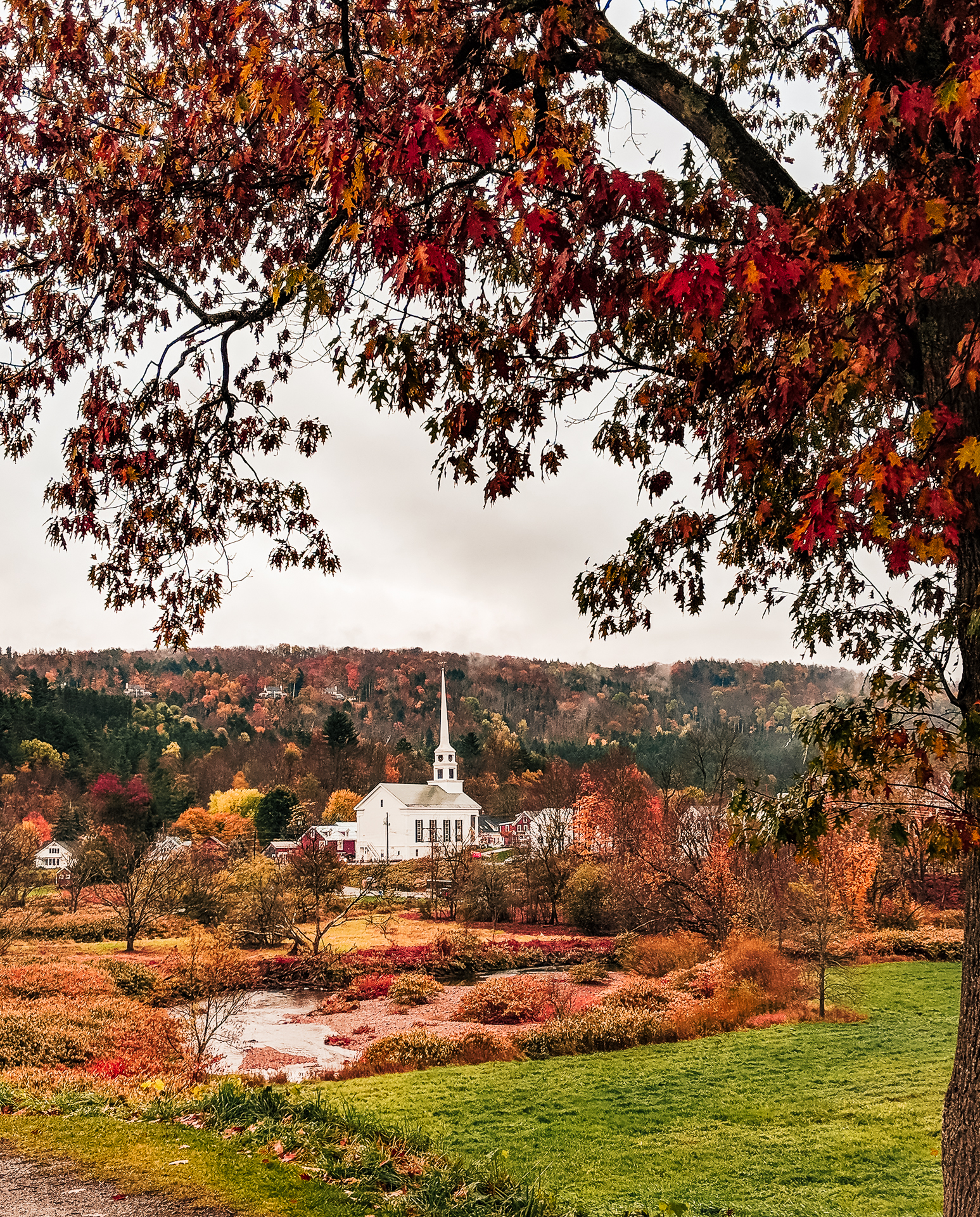 Top 5 Best Vermont Towns to Visit in the Fall featured by top New England travel blogger, Shannon Shipman: image ofStowe Vermont