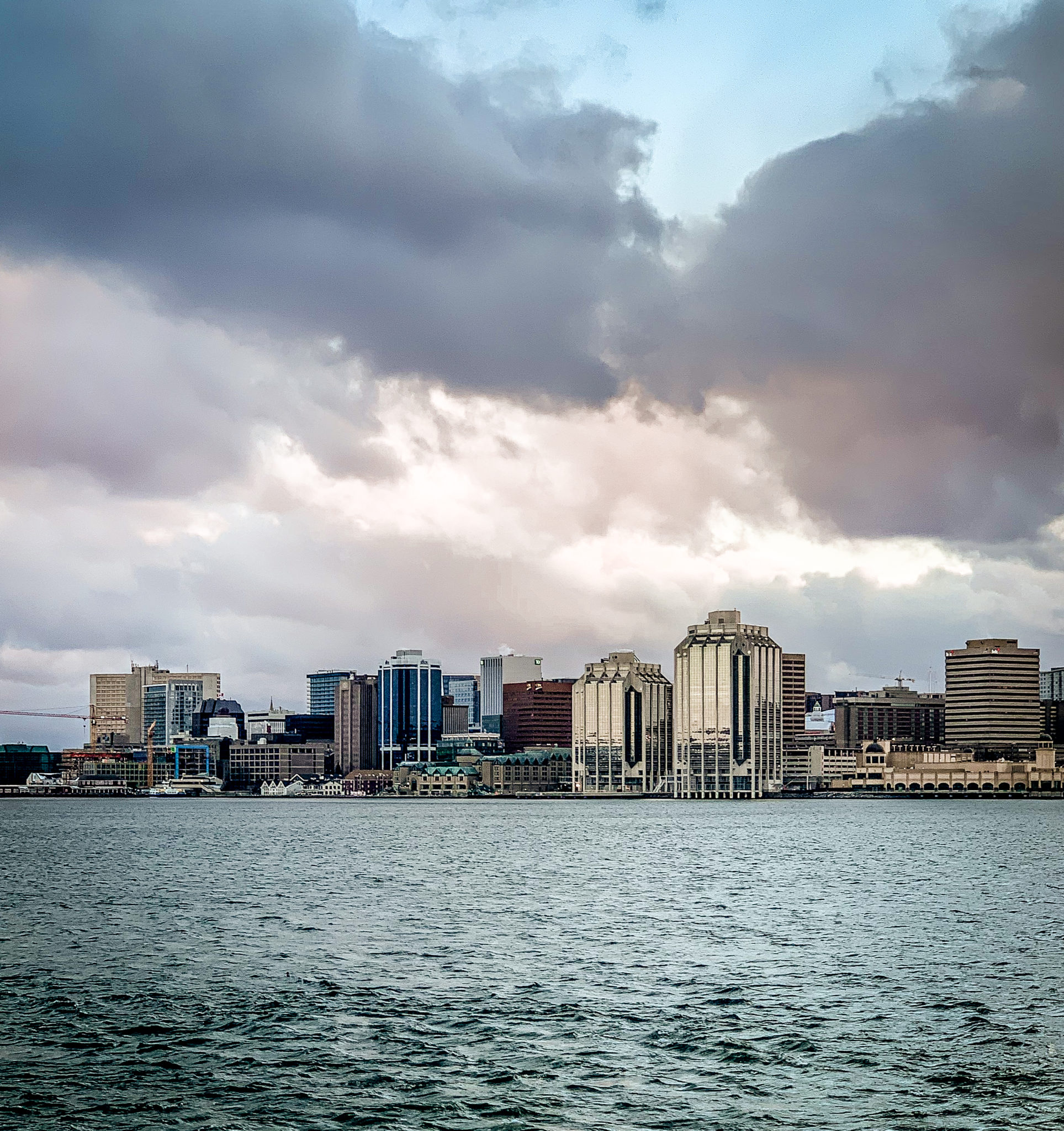 5 Reasons You Should Visit Nova Scotia in the Winter featured by top US travel blogger, Shannon Shipman: image of Halifax skyline