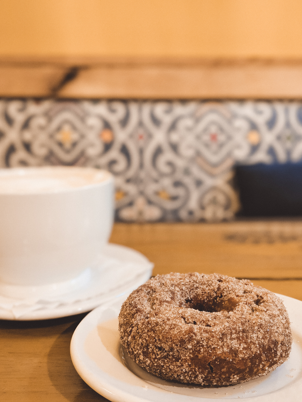 Top 5 Best Vermont Towns to Visit in the Fall featured by top New England travel blogger, Shannon Shipman: image of apple cider donuts
