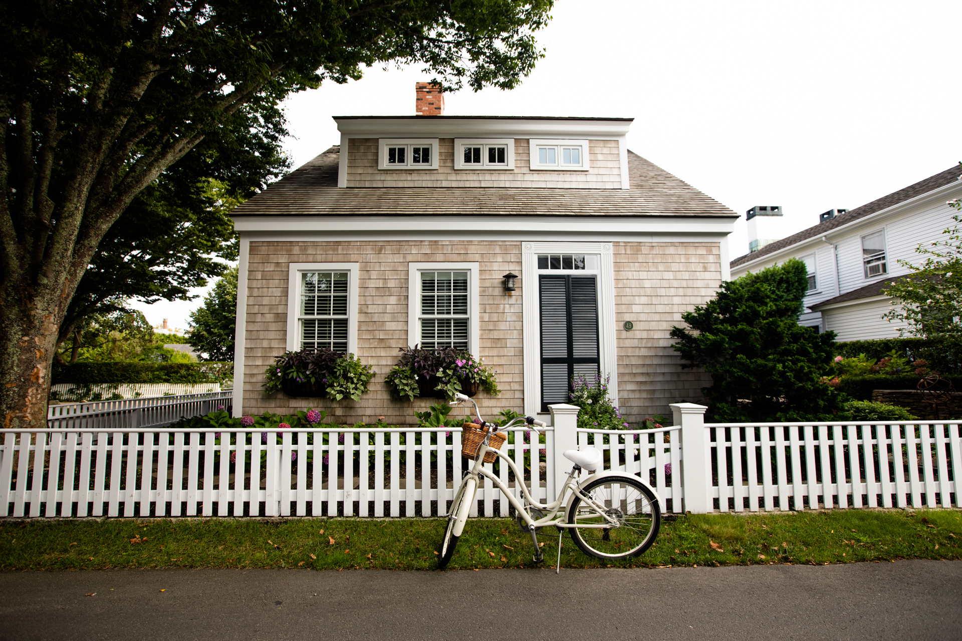 The 5 Best Things to do in Martha's Vineyard in October featured by top New England travel blogger, Shannon Shipman: image of riding bikes in Edgartown