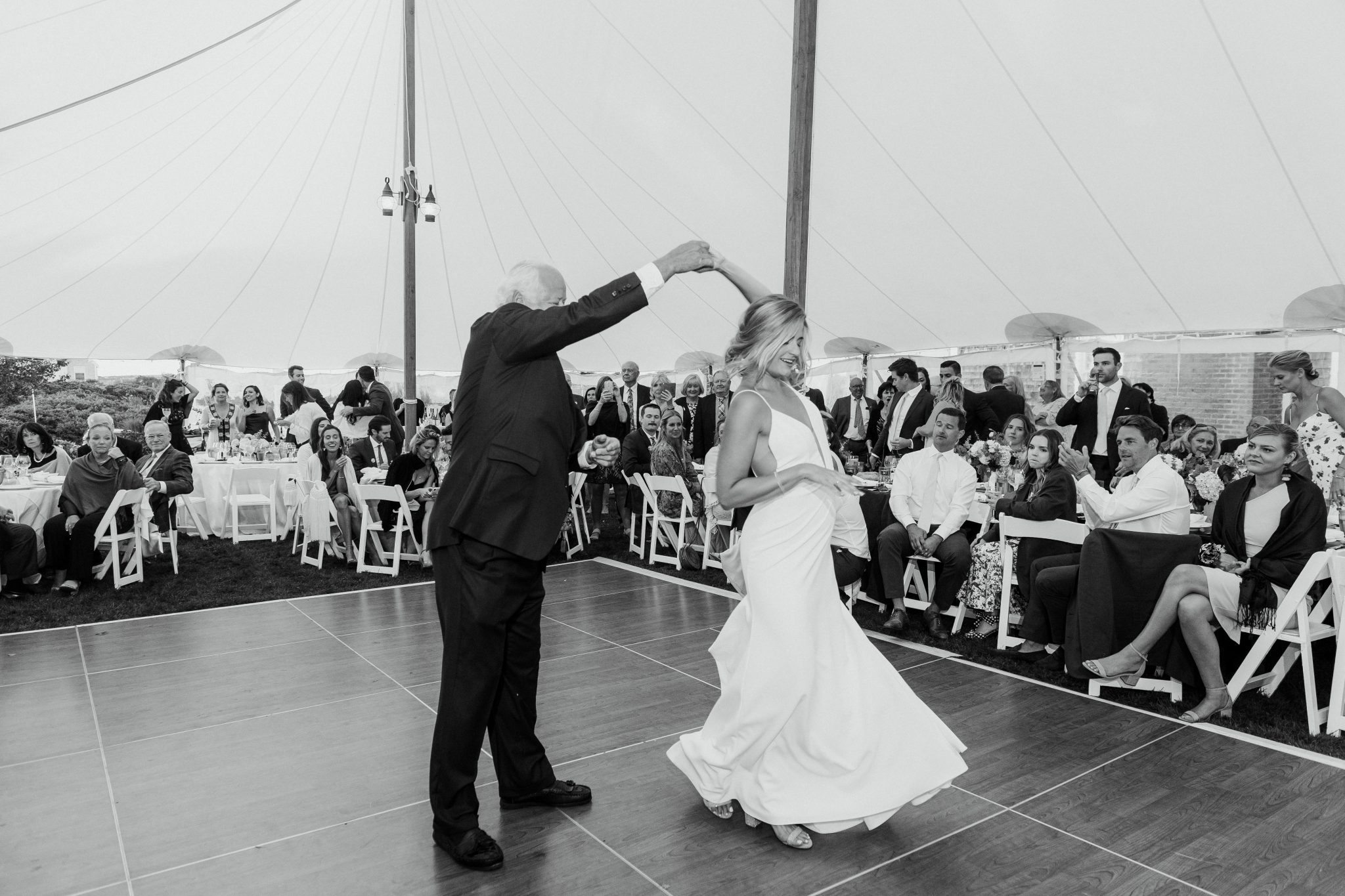 Wedding Photography Tips: How to Take Gorgeous Indoor Wedding Photos by popular New England photographer, Shannon Shipman: image of a bride dancing with her father. 